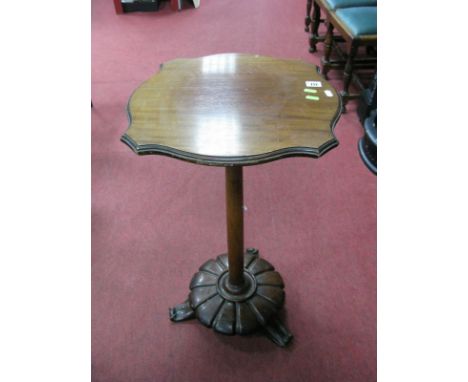 XIX Century Mahogany Pedestal Table, having serpentine top, turned support, melon base, tripod foot. 