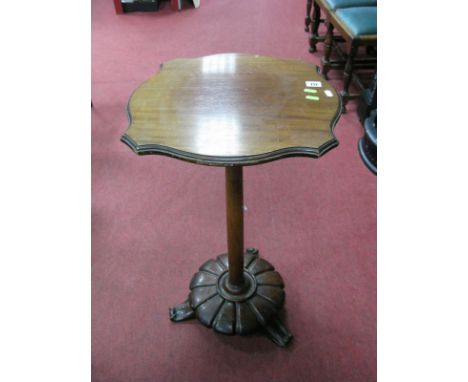 XIX Century Mahogany Pedestal Table, having serpentine top, turned support, melon base, tripod foot. 