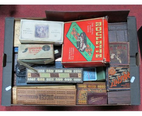 A Large Assortment of Cribbage Boards and Boxes, wooden and plastic. Also several draughts sets.