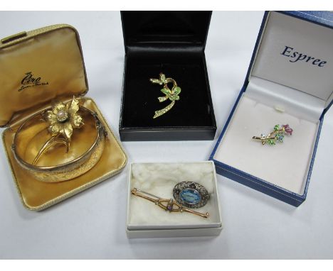 A Hallmarked Silver Single Stone Brooch, a hallmarked silver gilt bangle, bar and other brooches. 