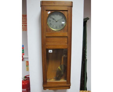 1940's Continental Mahogany Case 8 Day Wall Clock, with a silver dial, glazed door, two brass weights. 