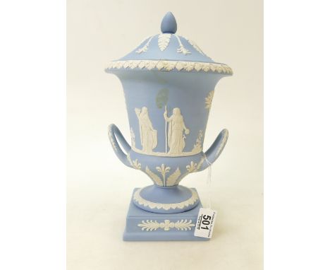 Wedgwood jasperware two handled urn &amp; cover: decorated with classical scenes in light blue jasperware, height 30cm.