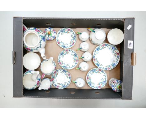 A collection of Royal Cauldon Victoria patterned tea ware: Cauldon items to include - cups, saucers, tea pot, lidded pots etc