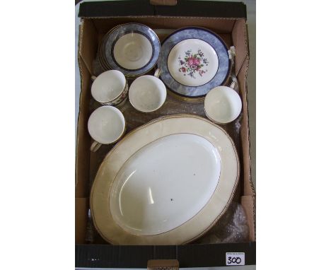 A mixed collection of Tea and Dinner ware to include: Wedgwood Crown Ivory large serving platters Royal Doulton Centennial Ro