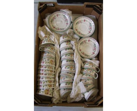 A large collection of Minton Haddon Hall Trellis pattered cups and saucers.: