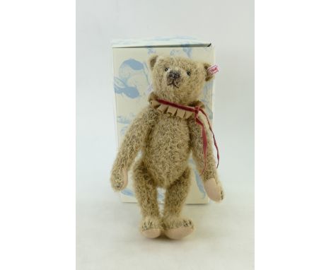 Boxed Limited edition Steiff Teddy Bear Millie: Bear in golden brown, height 30cm with certificate.