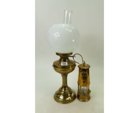 Brass ware: Brass Oil lamp &amp; Glass shade, together with Eccles minors lamp. (2)