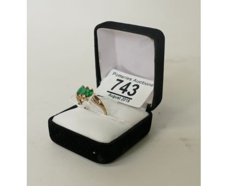 9ct ladies ring: 9ct ring set with three semi precious green stones, size R, .2.2 grams. 