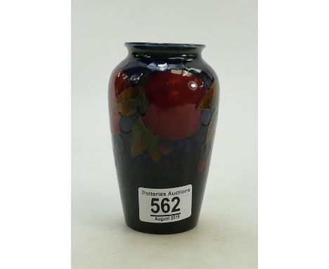 Moorcroft Pomegranate &amp; Berries vase: on deep blue ground, height 14cm