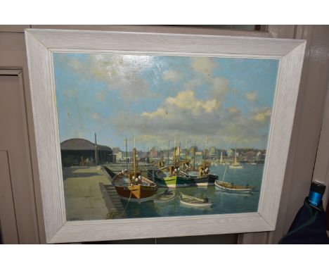 W. GOODMAN (BRITISH 20TH CENTURY), FISHING BOATS MOORED AT A QUAYSIDE, figures are in tenders to the foreground, signed botto