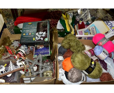 FOUR BOXES OF CHRISTMAS DECORATIONS, BALLS OF WOOL AND CROCHET PATTERNS, to include a large selection of wool including Sirda