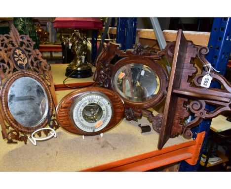 TWO WOODEN FRAMED MIRRORS AND A BAROMETER, comprising a hall mirror with shelf, carved with scrolls and flowers, height 51cm 