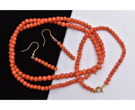 A CORAL NECKLACE, BRACELET AND EARRING SET, each comprised of approximately 5mm circular beads, approximate necklace length 5