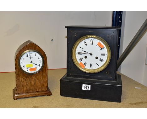 TWO MANTEL CLOCKS, to include an oak arched case mantel clock with inlaid banding, and white enamel dial bearing Arabic numer