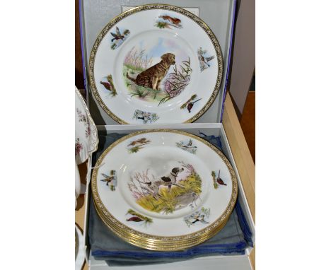 A BOXED SET OF SIX WEDGWOOD LIMITED EDITION BONE CHINA' SPORTING DOGS' PLATES, no.129 / 200, printed and painted with 'Golden