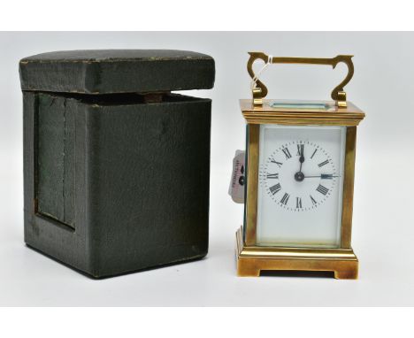 AN EARLY 20TH CENTURY BRASS CASED CARRIAGE CLOCK, small brass carriage clock with five bevelled glass viewing panels, white e