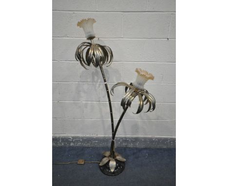 A MID CENTURY BRASS TWIN BRANCH FLOOR LAMP, of a tropical plant with bamboo effect stem, with etched glass shades, on an ebon