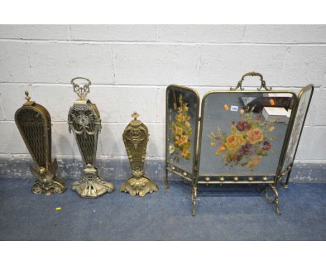 THREE EARLY 20TH CENTURY BRASS PEACOCK FIRE SCREENS, along with a brass gypsy mirrored folding fire screen (4)