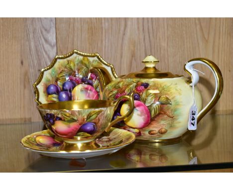 FOUR PIECES OF AYNSLEY ORCHARD GOLD, comprising a teapot, a cabinet teacup with gilt interior, handle and foot rim and saucer