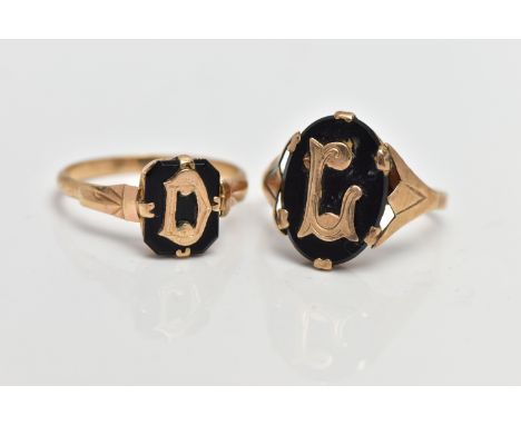 TWO VICTORIAN INITIAL MOURNING RINGS, the first designed with an oval cut onyx displaying the initial 'L', six claw set to th