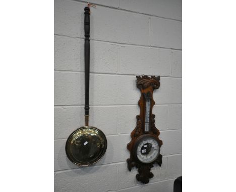 AN EDWARDIAN OAK ANEROID BAROMETER, singed C&amp;R Winter of Preston, along with brass warming pan (2)