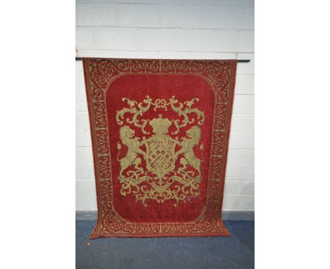 A FABRIC WALL TAPESTRY of a gold coat of arms within a red field, on a wrought iron pole, 175cm x 233cm (condition:-some thre