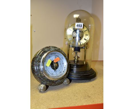 A GLASS DOMED SKELETON CLOCK TOGETHER WITH A BAROMETER, a hand crafted Cornish Serpentine SB Shortland barometer cased in mar