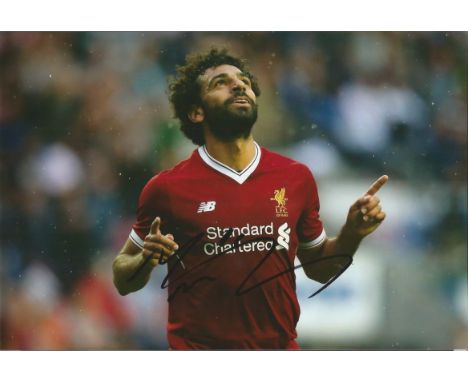 Mo Salah Signed Liverpool football 8x12 Photo. Good condition.  All signed items come with our certificate of authenticity. W