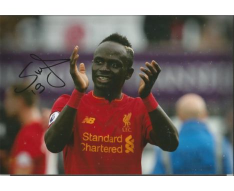 Sadio Mane Signed Liverpool football 8x12 Photo . Good condition.  All signed items come with our certificate of authenticity