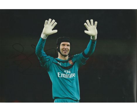 Petr Cech Signed Arsenal football 8x12 Photo . Good condition.  All signed items come with our certificate of authenticity. W