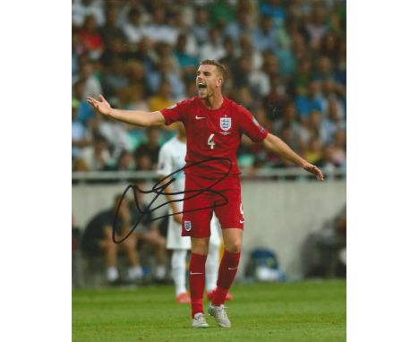 Jordan Henderson Liverpool Signed England football 8x10 Photo . Good condition.  All signed items come with our certificate o