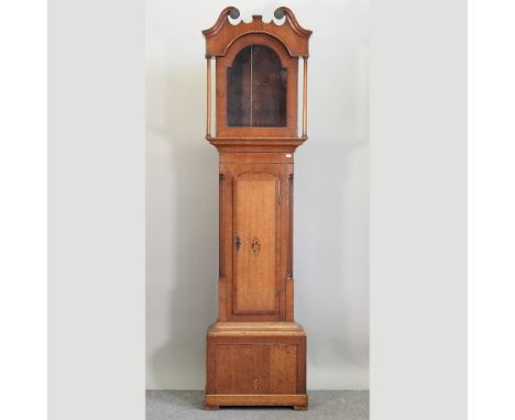 A George III oak and inlaid longcase clock case, 200cm high