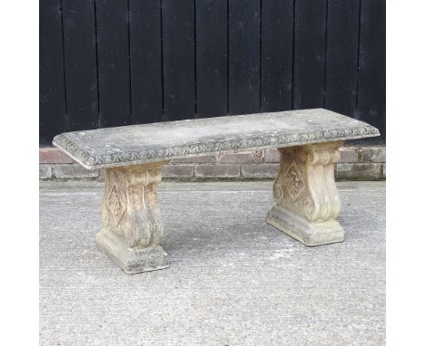 A reconstituted stone garden bench, 117cm