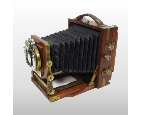 An early 20th century Sanderson Unicum BB Instantograph patent plate camera body, 1902, with a Bausch &amp; Lomb lens, 14cm, 