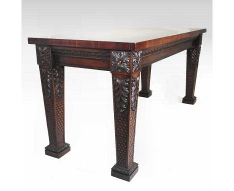 A large and impressive 19th century carved mahogany centre table, of large proportions, of rectangular shape, with an scroll 