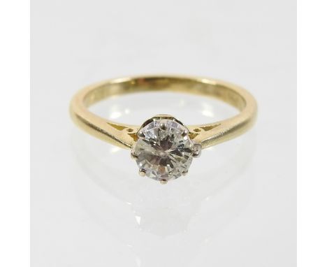 An 18 carat gold solitaire diamond ring, approximately 0.65 carats, size K