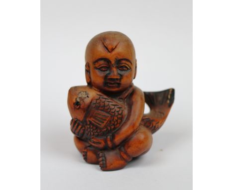Netsuke signed to base