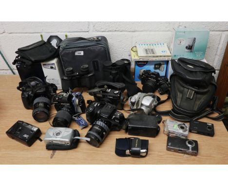 Large collection of camera equipment to include binoculars 