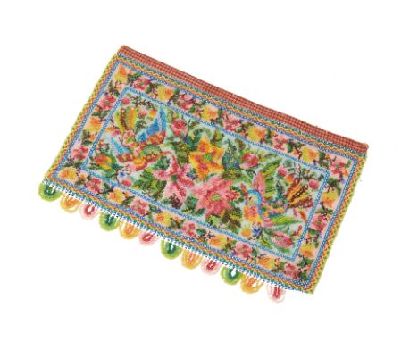 A PERANAKAN BEADED PANEL
From the collection of Dr Ho Wing Meng
The design featuring birds amongst flowers and foliage
25cm w