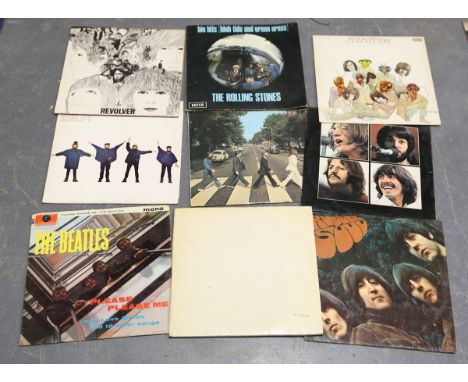 A collection of approximately eighty LP records, including albums by The Beatles and The Rolling Stones.Buyer’s Premium 29.4%