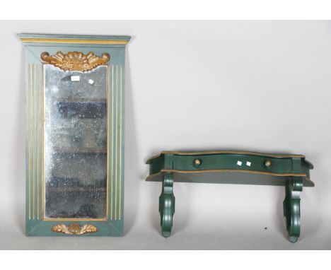 A modern green and gilt painted pier mirror, height 93cm, width 50cm, together with matching console shelf, width 78cm.Buyer’