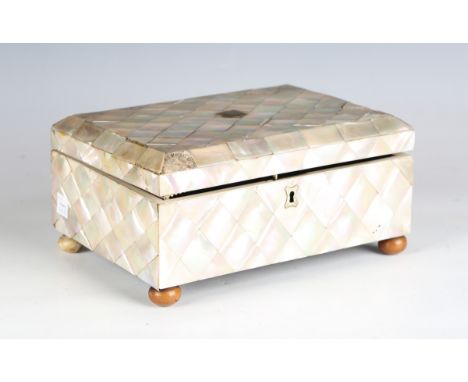 A late 19th century mother-of-pearl veneered rectangular workbox with silk-lined interior and vegetable ivory feet, width 23c