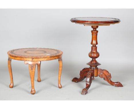 A 20th century Indian fruitwood occasional table with a carved foliate top, height 37cm, diameter 57cm, together with a repro