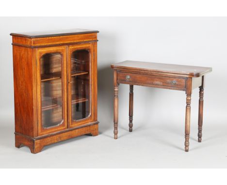 A 19th century mahogany 'D' shaped fold-over tea table, fitted with a drawer, on ring turned legs, height 73cm, width 90.5cm,