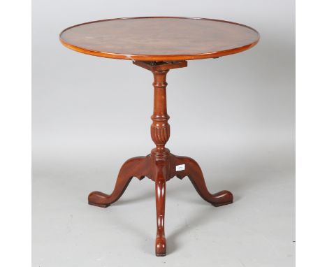 A late 20th century reproduction pollard oak and hardwood tip-top wine table with a birdcage mount and tripod legs, height 69