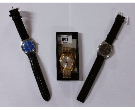 Three Gents Wristwatches, a Seiko Mechanical Model on brown leather strap, a Russian Wostok (just serviced) & a Camy on leath