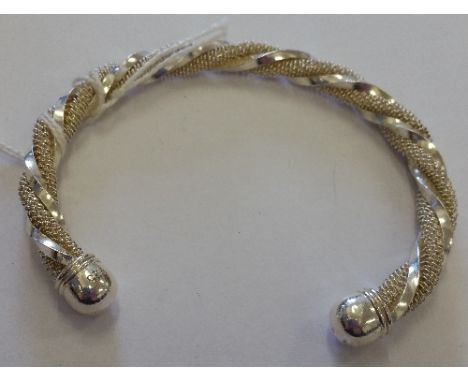 A Silver Bangle.