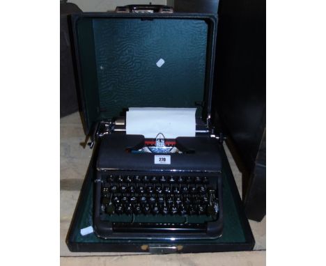 A Vintage Cased Portable Typewriter.