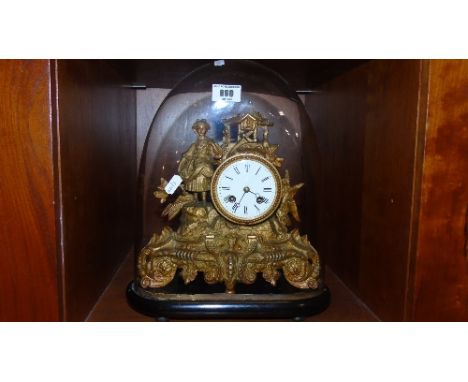 A Late 19th Century Mantel Clock with white enamel dial with Roman numerals under a glass dome on an ebonised base.  (key and