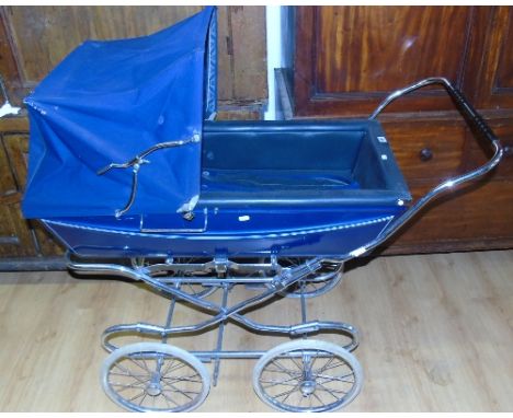 Best Bid: A Good Vintage Silver Cross Pram.